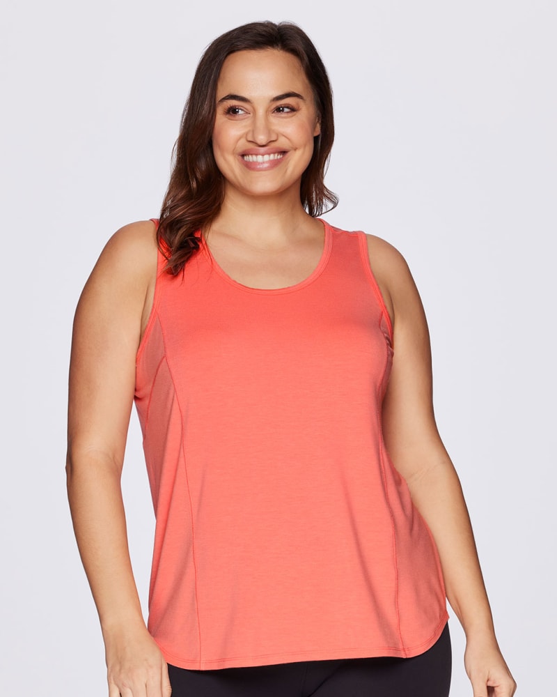 Front of a model wearing a size 1X Plus Daily Tank in Coral by RBX Active. | dia_product_style_image_id:294484